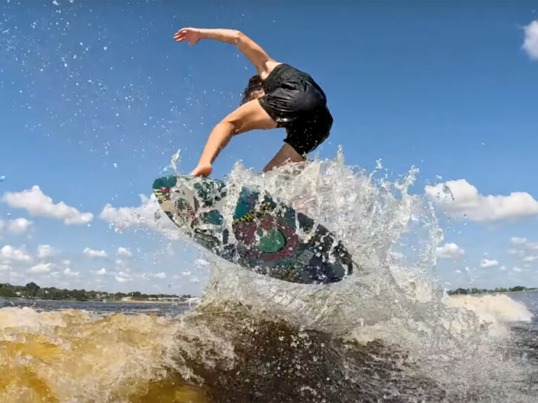 Jett Lambert performs backside alley oop