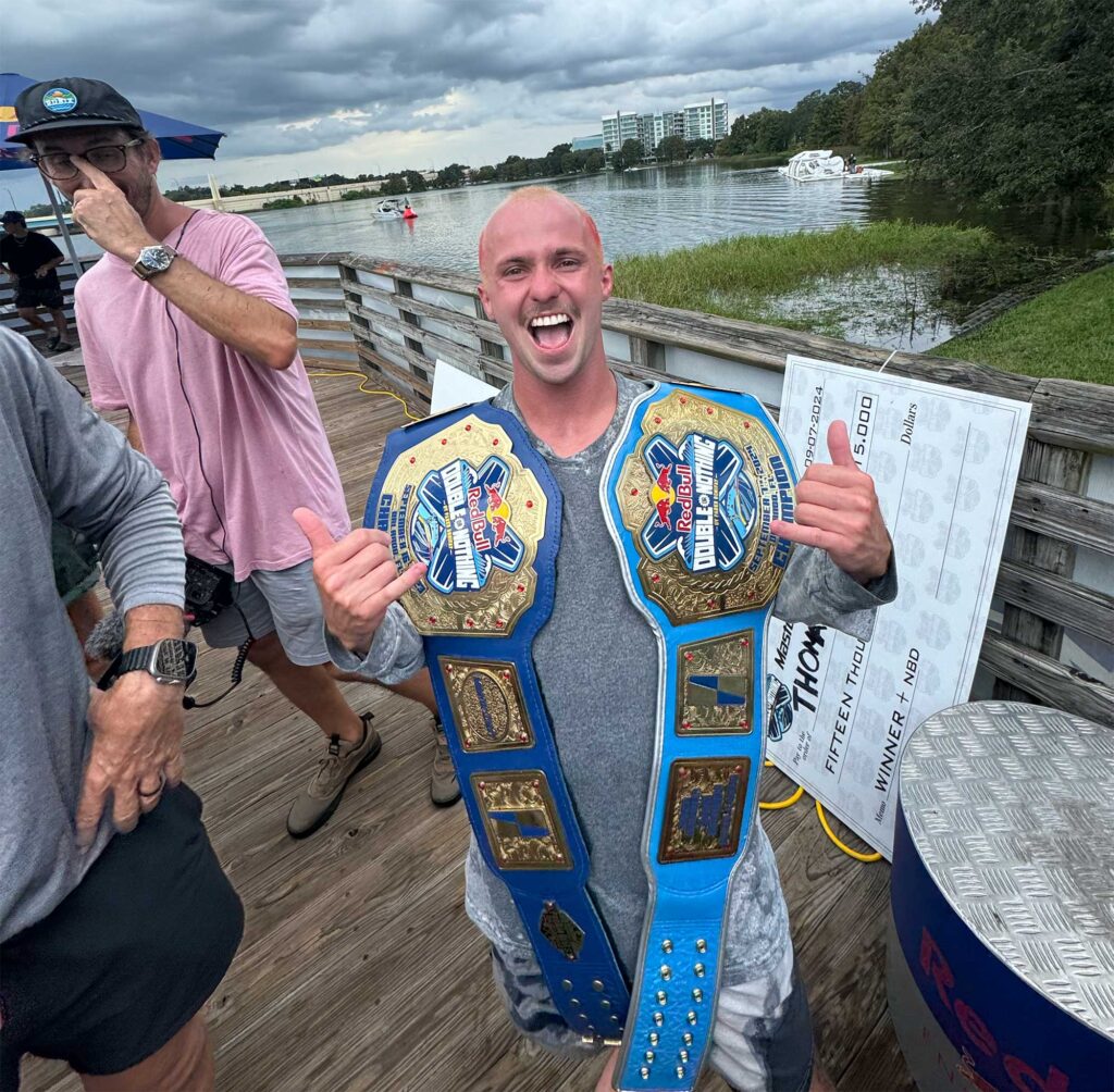 Thomas Herman with two belts from Red Bull Double Up