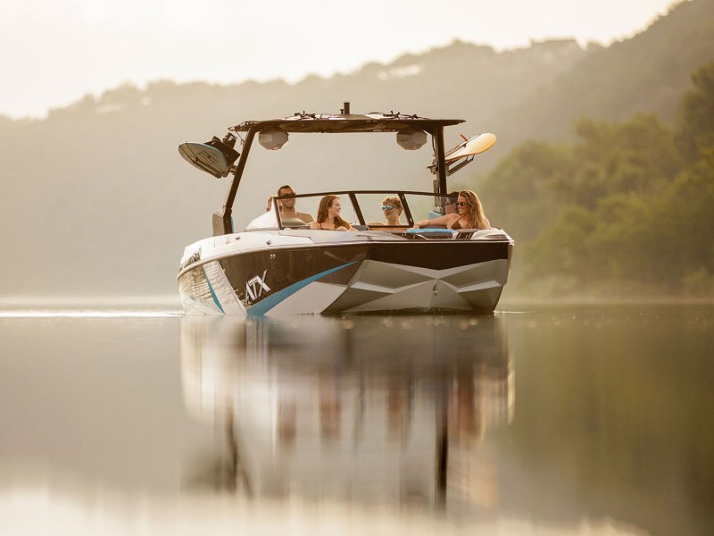 WSP825-atx-22-type-s ATX 22 Type-S Surf Boat on the lake