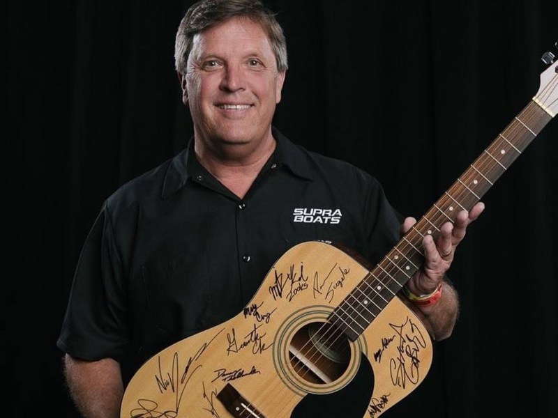 Rick-Tinker-Headshot Rick Tinker with signed guitar